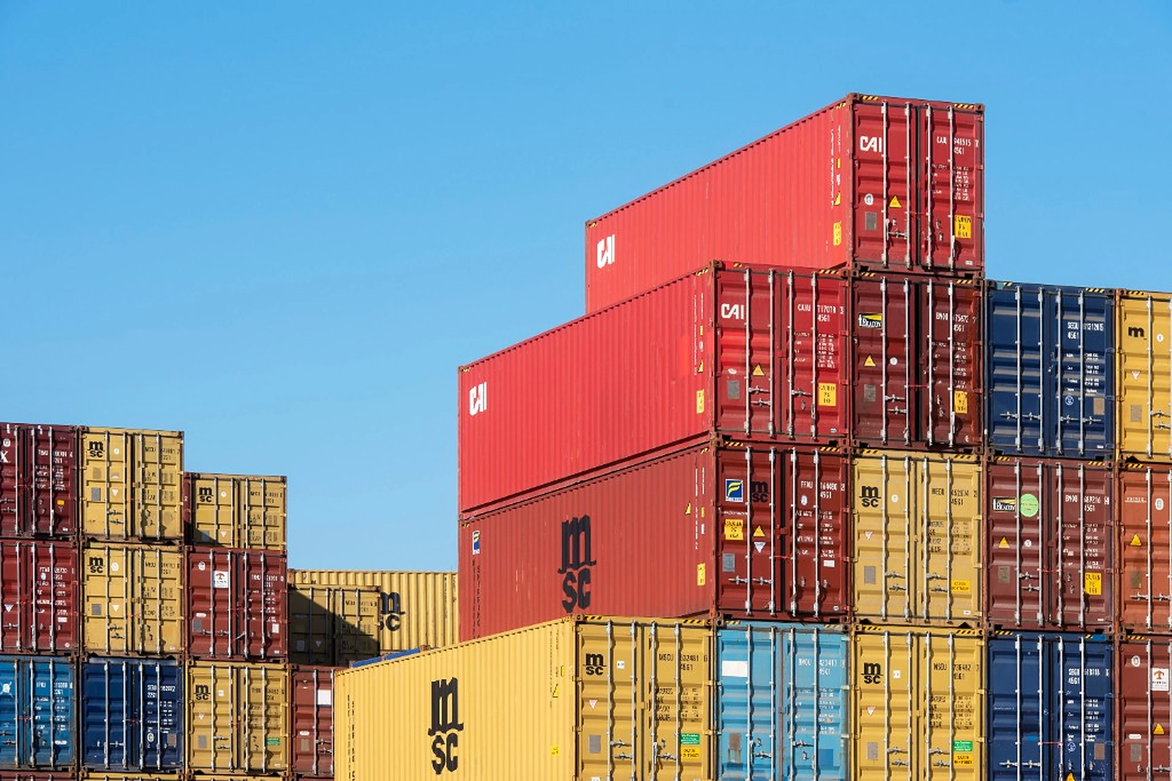 Stacked shipping containers at port